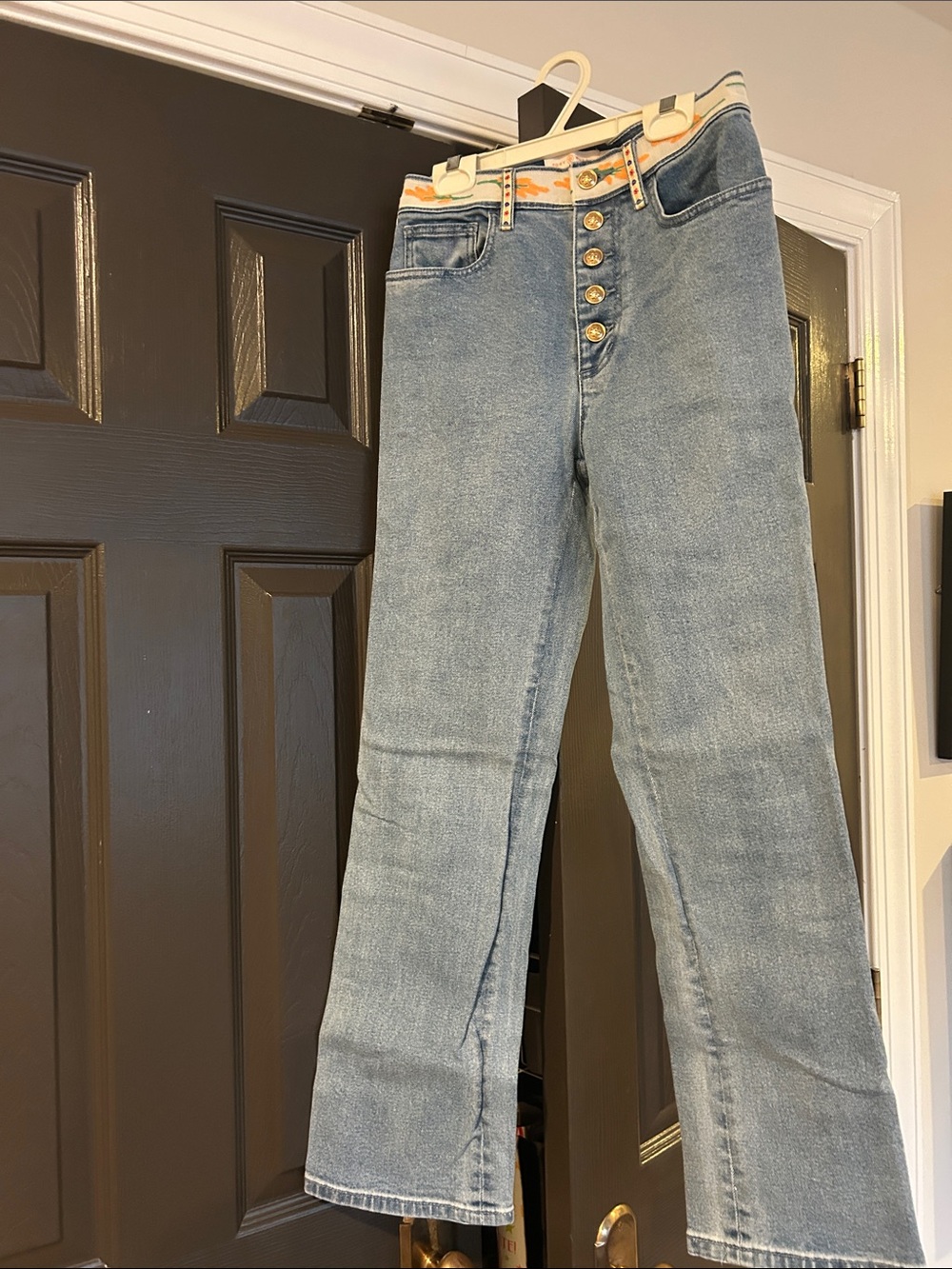 Tory Burch Light Blue Straight Leg Jeans with Gold Button and Ribbon Detail
